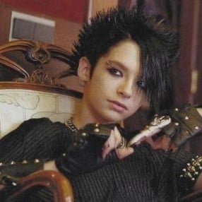Bill Kaulitz. Taking care of a little psychopath...