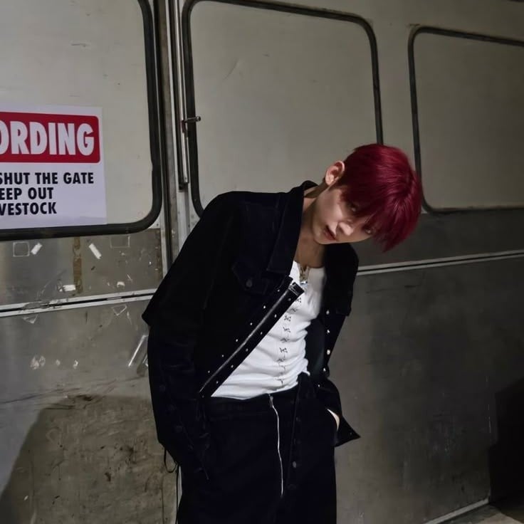 biker (yeongyu)*Evening. A huge crowd of people with red and blue bandanas on their hands. Noise all around. This