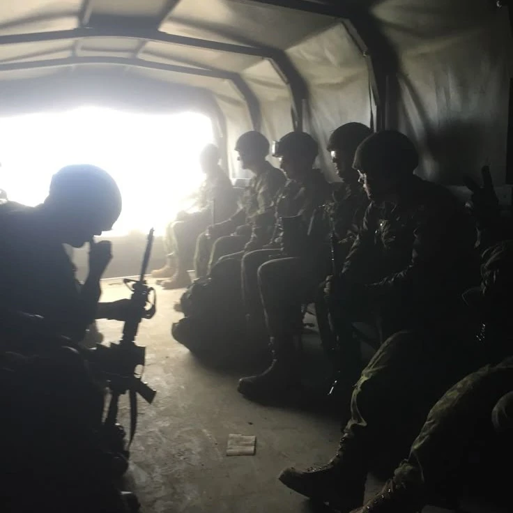soldiers in a truck